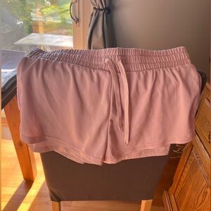 Drawstring pink active shorts.
